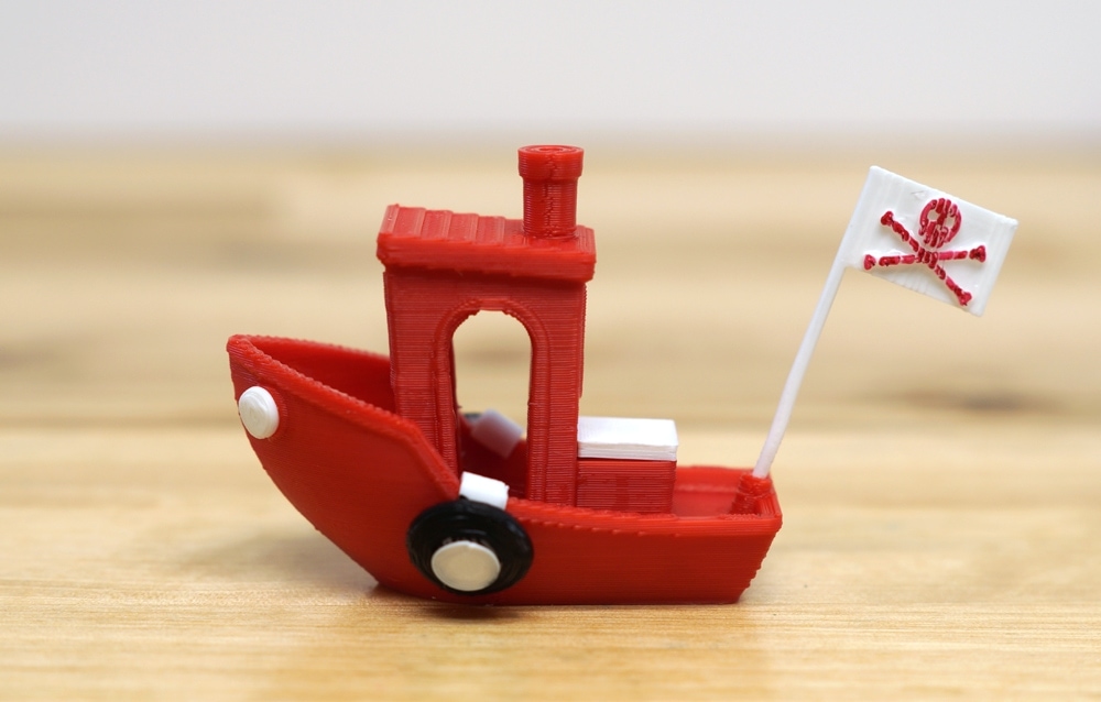 red 3d printed boat with pirate flag